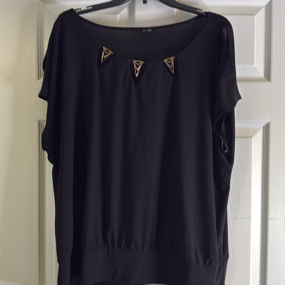 Gently used women’s dress top